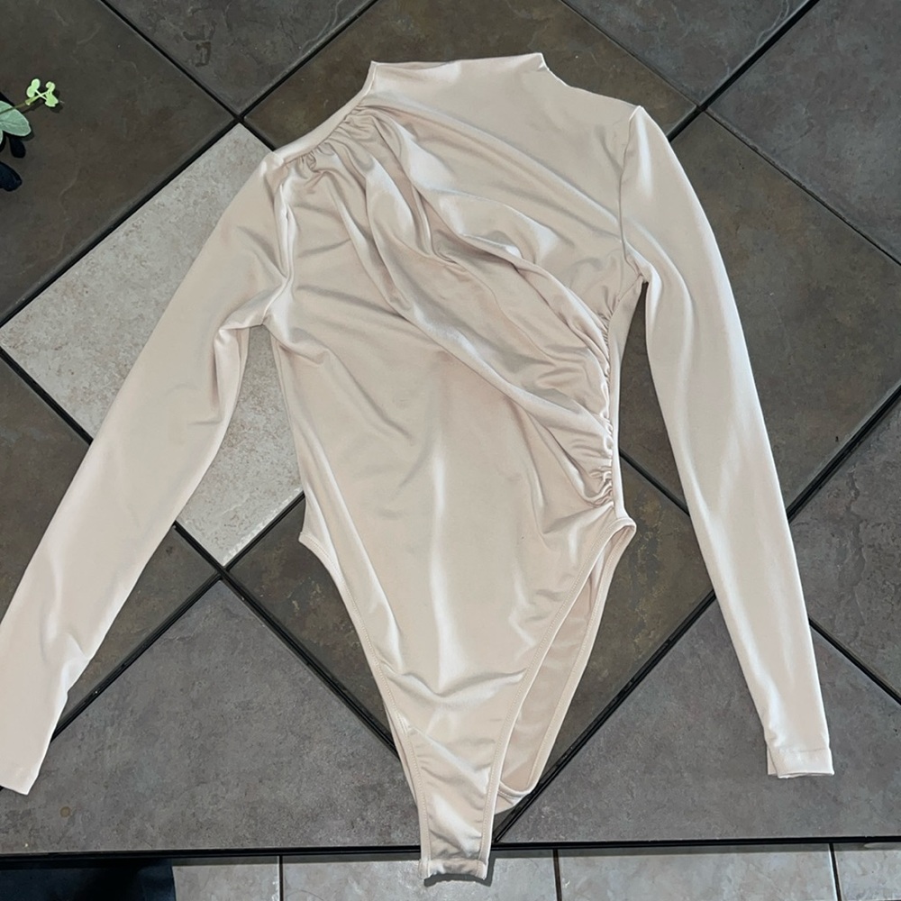 Beige long sleeve Shein body suit in an XS